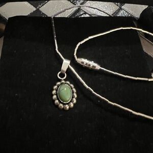 Liquid silver necklace with tiny pendant